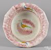 Red spatter basin with peafowl decoration, 4 5/8'' h., 14 3/4'' dia.