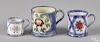 Three blue spatter mugs with strawberry thumbprint and Adam's rose decoration