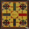 Painted pine double-sided Parcheesi gameboard, 19th c., the reverse with checkers, 20'' x 20''.