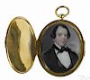 Miniature portraits on ivory of a husband and wife, 19th c., framed in a chased gold locket