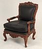 GRAND LOUIS XV STYLE MAHOGANY AND PARTIAL GILTWOOD FAUTEUIL DU ROI