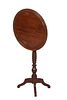 French Louis Philippe Carved Walnut Tilt Top Candlestand, 19th c., the dished top on a turned tapered support to tripodal splayed legs, H.- Open- 38 3