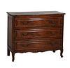 French Louis XV Style Carved Oak Commode, early 20th c., the stepped ogee edge cookie corner top over three fielded panel bowed drawers, flanked by re