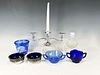 BLUE GLASSWARE AND SILVER CANDLE STICK