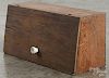 Putnam Dyes counter top pine display case, early 20th c., with a cubby hole interior, 10'' h.