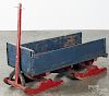 Child's painted pine pull box sled, ca. 1900, retaining an old red and blue surface, 37'' l.