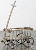 Child's primitive pull cart, 19th c., retaining on old yellow and blue surface, 18'' l.