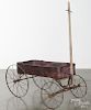 Painted and stenciled tin Express wagon, late 19th c., 36'' l. Provenance: Barbara Hood