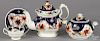 Gaudy Welsh Tricorn pattern teapot, 8'' h., together with a covered sugar, a tea cup and a saucer.