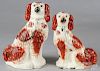 Two Staffordshire spaniels, 14 1/2'' h. and 12 1/2'' h.
