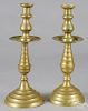 Large pair of Victorian brass candlesticks, late 19th c., with a drip pan, 19'' h.