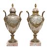 * A Pair of Neoclassical Gilt Bronze Mounted Marble Urns Height 21 1/2 inches.