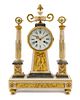 An Empire Gilt Bronze Mounted Marble Mantel Clock Height 19 1/2 inches x width 13 3/4 x depth 4 inches.