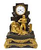 * A French Gilt and Patinated Bronze Mantel Clock Height 18 3/4 inches.