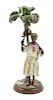 A Continental Cold Painted Cast Metal Figural Candlestick Height 8 3/4 inches.
