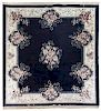 * A Chinese Wool Rug 9 feet 1/2 inches x 7 feet 10 inches.