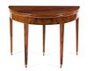 A George III Mahogany Flip-Top Table Height 29 1/4 x width 39 1/4 x depth 19 1/2 inches (closed).