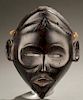 West African face mask, 20th century.