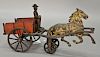 Early Carpenter cast iron tip coal cart circa 1885, pat. May 25 80 82 83 and 84, cart is fitted with tipping mechanism and the bed i...