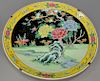 Chinese famille rose porcelain charger having yellow border with flowers and painted center panel with blossoming flowers. dia. 18 1...