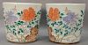 Pair of famille rose porcelain pots having painted wild flowers and butterflies, 19th to 20th century. ht. 15in., dia. 15 1/2in. Pro...
