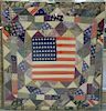 Patriotic crazy quilt center flag, silk and rayon, triangle crazy borders, probably New Hampshire circa 1930, stretched and in plexi...