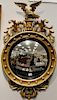 Federal gilt convex girandole mirror having eagle top and foliate base with original gilt, circa 1840, (some loses). ht. 44in., wd. ...