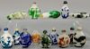 Fourteen overlay glass snuff bottles depicting deer, dragons, phoenix birds, goats, cranes, etc.  ht. 2 1/4in. to 3in.