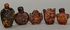 Five small amber snuff bottles carved with monkeys, dragons, mice, and frogs.  ht. 1 1/2in. to 2 1/4in.