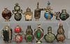 Twelve silver and jeweled mounted snuff bottles to include six silver mounted dragon hardstone bottles, six snuff bottles mounted wi...