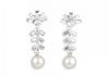A Pair of Diamond and Pearl Dangle Earrings