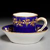 Sevres jeweled cobalt teacup and saucer, 18th c.