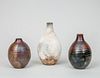 Two Chinese Bronze Glazed Pottery Vases and a Chinese White Glazed Pottery Vase