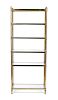 A Neoclassical Style Brass Etagere Height 75 x width 30 x depth 13 3/4 inches.