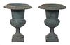 A Pair of Cast Iron Garden Urns Height 30 1/2 inches.