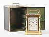 A good hour repeating carriage clock with brass bound wooden case signed James McCabe