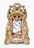 A good later 19th century rococo style enamel paneled carriage clock by Drocourt