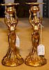 * A Pair of Figural Candlesticks. Height 9 inches.