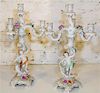 * A Pair of German Figural Four Light Candelabra. Height 19 1/2 inches.