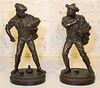 * A Pair of Continental Cast Metal Figures. Height 20 3/4 inches.