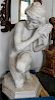 * A Continental Carved Marble Figure. Height 40 inches.