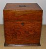 * An American Oak Decanter Case Height 14 1/8 x width 13 1/4 x depth 10 inches.