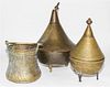 * Three Middle Eastern Cast Metal Vessels Height of taller 19 inches.