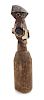 * An African Carved Wood Yaka Pounder, Congo Height 23 x diameter 4 1/2 inches.