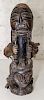 An African Carved Wood Figure. Height of 21 1/2 inches.