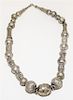 A Bedouin Silver and Mixed Metal Beaded Necklace Length of chain 25 inches.