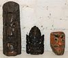 A Group of Three Carved Wood Masks Height of tallest 14 1/2 inches.