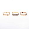 Tres anillos con diamantes en oro amarillo 14k. 52 diamantes corte 8 x 8. Talla: 6. Peso: 17.2 g.