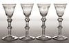 ENGLISH FREE-BLOWN AND ENGRAVED AIR-TWIST BALUSTROID SET OF FOUR WINES