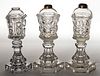 ASSORTED PRESSED PATTERN FLUID STAND LAMPS, LOT OF THREE,